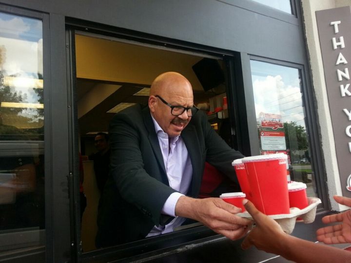 Tom Joyner hands out food at a Wendy’s in New Orleans