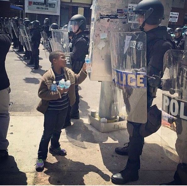 Maryland Boy Photoed Handing Out Water to Police Officers