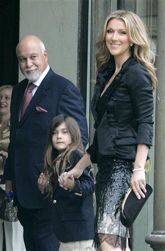 FILE - In this May 22, 2008 file photo, Canadian singer, Celine Dion, right, arrives with her son Rene-Charles, center, and her husband Rene Angelil, left, at the Elysee Palace to be awarded of the Legion d'Honneur by French President Nicolas Sarkozy, in Paris. Angelil, Dion's husband and manager, has died at his suburban Las Vegas home, authorities said Thursday, Jan. 14, 2016. He was 73 and had battled throat cancer. (AP Photo/Thibault Camus, File)