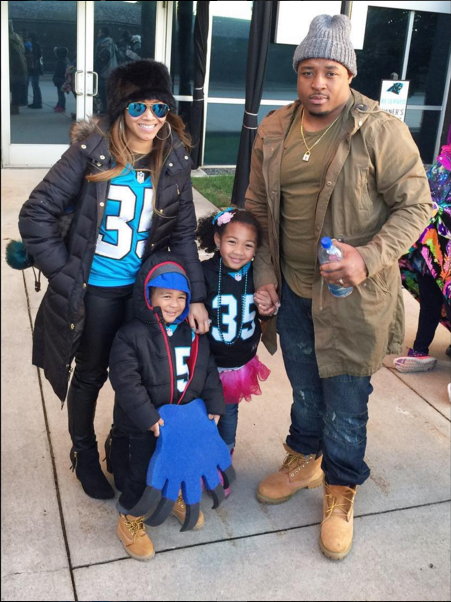 Mike Tolbert of the Panthers, his wife Shia and their children.