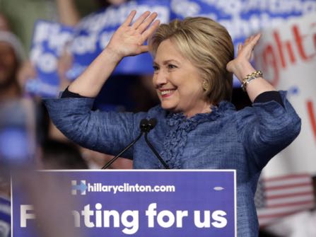Democratic presidential candidate Hillary Clinton acknowledges the crowd during an election night event at the Palm Beach County Convention Center in West Palm Beach, Fla., Tuesday, March 15, 2016. (AP Photo/Lynne Sladky)