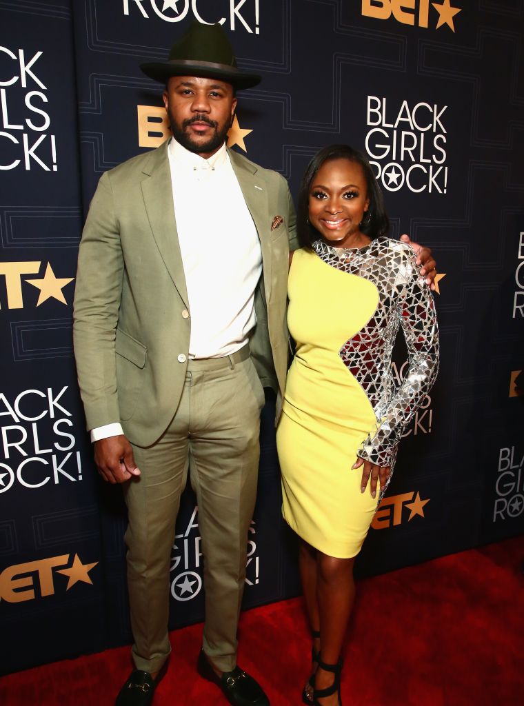 'Game' star Hosea Chanchez and 'Power' star Naturi Naughton hug it out.
