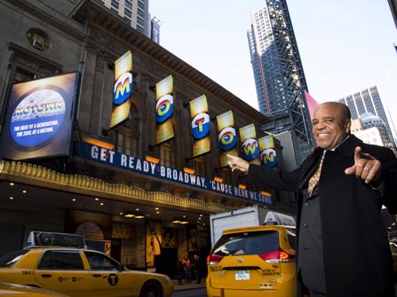 FILE - This March 5, 2013 file photo shows Berry Gordy posing for a portrait in front of the Lunt-Fontanne Theatre where "Motown: The Musical," opened on Broadway in New York. The hit musical about Gordy is coming back to Broadway this summer for an 18-week stand at the Nederlander Theatre. (Photo by Charles Sykes/Invision/AP, File)