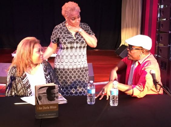 Sybil Wilkes and Charlie Wilson chat after her book club.