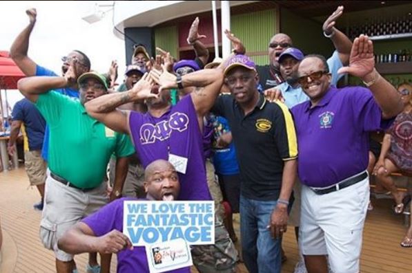 The Omegas representing on the boat