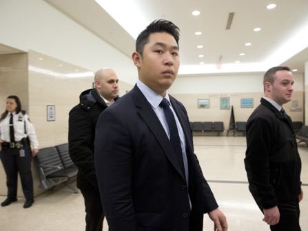 FILE - In this Feb. 9, 2016 file photo, former New York City police officer Peter Liang, center, returns to the courtroom after a break in his trial on charges in the shooting death of Akai Gurley, at Brooklyn Supreme court in New York. Liang was fired from the police force shortly after the February jury verdict in the death of Gurley. Liang will find out if he's going to prison during sentencing on Tuesday, April 19, following his manslaughter conviction in the accidental shooting death of the unarmed man in a darkened stairwell. (AP Photo/Mary Altaffer, File)