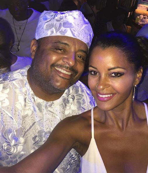 Roland Martin takes a flick with Claudia Jordan.