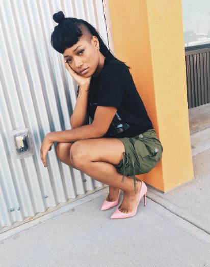 …and now she’s back to long hair but with both sides shaved off.