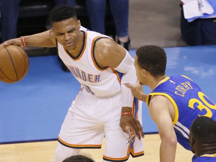 Oklahoma City Thunder guard Russell Westbrook (0) is defended by Golden State Warriors guard Stephen Curry (30) during the first half in Game 4 of the NBA basketball Western Conference finals in Oklahoma City, Tuesday, May 24, 2016. (AP Photo/Sue Ogrocki)