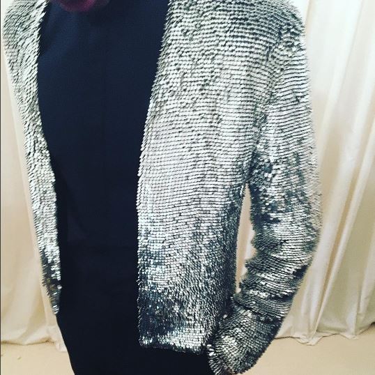 Tyga showed off his Balmain jacket before hitting the carpet.