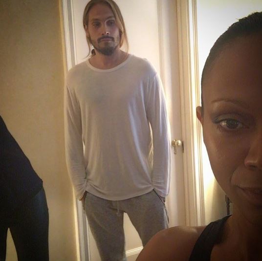 Zoe Saldana gets dolled up, snaps a selfie all while her hubby watches.