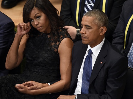 President Barack Obama and first lady Michelle Obama attend an interfaith memorial service for the fallen police officers and members of the Dallas community at the Morton H. Meyerson Symphony Center in Dallas, Tuesday, July 12, 2016. (AP Photo/Susan Walsh)