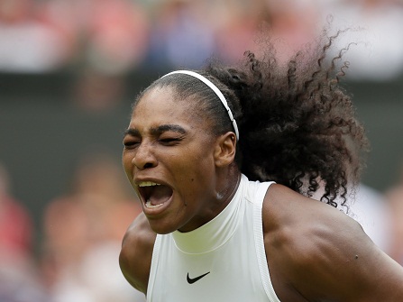 Serena Williams of the U.S celebrates a point against Angelique Kerber of Germany during the women's singles final on day thirteen of the Wimbledon Tennis Championships in London, Saturday, July 9, 2016. (AP Photo/Tim Ireland)