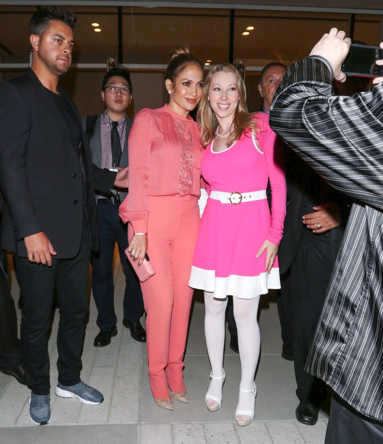 Jennifer Lopez takes a moment with a fan.