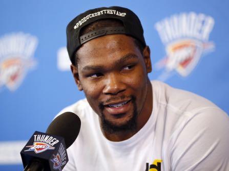 Oklahoma City's Kevin Durant (35) speaks during a news conference at the team's practice facility in Oklahoma City, Wednesday, June 1, 2016. Durant, the face of the Oklahoma City franchise since its move from Seattle in 2008 is heading into free agency, and what he chooses to do could shake up the NBA landscape. Durant said Wednesday that he has not yet "wrapped" his mind around the idea of being a free agent. (Nate Billings/The Oklahoman via AP) LOCAL STATIONS OUT (KFOR, KOCO, KWTV, KOKH, KAUT OUT); LOCAL WEBSITES OUT; LOCAL PRINT OUT (EDMOND SUN OUT, OKLAHOMA GAZETTE OUT) TABLOIDS OUT; MANDATORY CREDIT