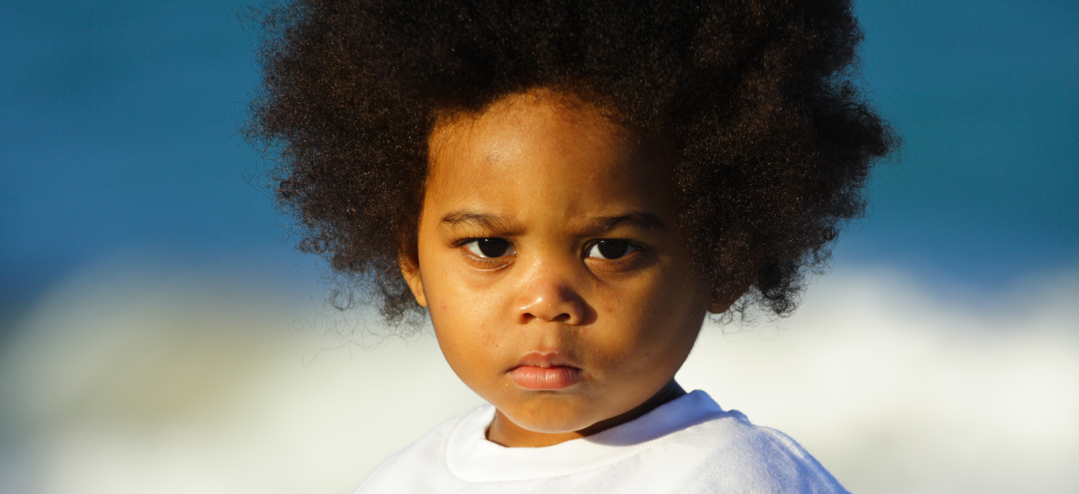 Young child with an afro hairstyle