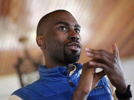 In this March 26, 2016 photo, Baltimore mayoral candidate DeRay Mckesson chats with campaign volunteers before canvassing in Baltimore. Mckesson is known on the national stage for his role in Black Lives Matter, but he's struggling as he campaigns for mayor in his hometown. (AP Photo/Patrick Semansky)