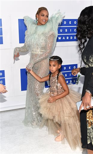 Beyonce, left, and her daughter Blue Ivy arrive at the MTV Video Music Awards at Madison Square Garden on Sunday, Aug. 28, 2016, in New York. (Photo by Evan Agostini/Invision/AP)