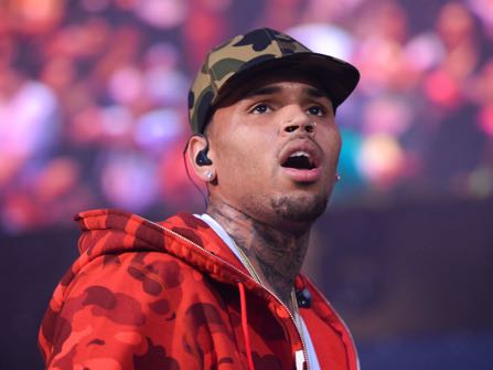 FILE - In this June 7, 2015 file photo, rapper Chris Brown performs at the 2015 Hot 97 Summer Jam at MetLife Stadium in East Rutherford, N.J. Former rap music mogul Marion "Suge" Knight is suing Chris Brown after getting shot seven times at a 2014 party hosted by the R&B singer. Knight's lawsuit filed Monday, June 27, 2016, in Los Angeles Superior Court accuses Brown and owners of the nightclub called 1 Oak of having inadequate security during the August 2014 party. (Photo by Scott Roth/Invision/AP, File)