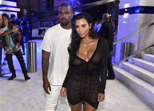 Kanye West, left, and Kim Kardashian West arrive at the MTV Video Music Awards at Madison Square Garden on Sunday, Aug. 28, 2016, in New York. (Photo by Chris Pizzello/Invision/AP)