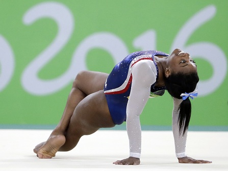 United States' Simone Biles performs on the floor during the artistic gymnastics women's individual all-around final at the 2016 Summer Olympics in Rio de Janeiro, Brazil, Thursday, Aug. 11, 2016. (AP Photo/David Goldman)