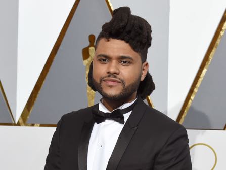 The Weeknd arrives at the Oscars on Sunday, Feb. 28, 2016, at the Dolby Theatre in Los Angeles. (Photo by Dan Steinberg/Invision/AP)