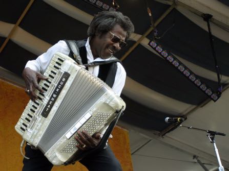 FILE - In this May 5, 2007 file photo, Buckwheat Zydeco performs during the 2007 Jazz and Heritage Festival in New Orleans. Stanley "Buckwheat" Dural Jr., who introduced zydeco music to the world through his namesake band Buckwheat Zydeco, has died. He was 68. His longtime manager Ted Fox told The Associated Press that Dural died early Saturday, Sept. 24, 2016. He had suffered from lung cancer.(AP Photo/Dave Martin)