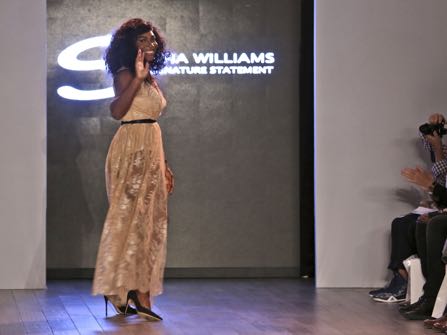 Serena Williams greets the crowd after showing her Serena Williams Signature Statement Spring 2017 collection during Fashion Week in New York, Monday, Sept. 12, 2016. (AP Photo/Seth Wenig)