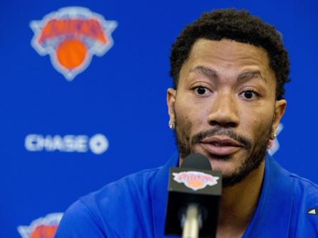 FILE - In this June 24, 2016, file photo, Derrick Rose speaks during a news conference at Madison Square Garden in New York. The NBA star Rose is due in a Los Angeles courtroom on Tuesday, Oct. 4, to fight a $21 million lawsuit by a former girlfriend who accuses him and two friends of gang raping her three years ago when she was incapacitated. The start of the trial in U.S. District Court conflicts with the Knicks preseason opener in Houston and it’s not clear which Rose will attend. (AP Photo/Mary Altaffer, File)