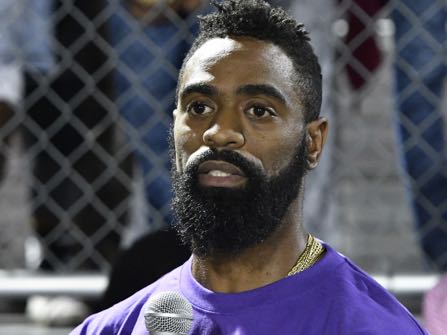 Former Olympian Tyson Gay speaks to the mourners gathered in memory of his daughter at Lafayette High School, Monday, Oct. 17, 2016, in Lexington, Ky. Trinity Gay, the 15-year old daughter of Tyson Gay was shot and killed early Sunday morning, Oct. 16, 2016, (AP Photo/Timothy D. Easley)