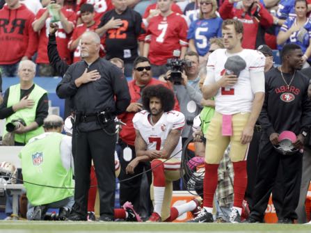 San Francisco 49ers quarterback Colin Kaepernick (7) kneels during the national anthem before an NFL football game against the Buffalo Bills on Sunday, Oct. 16, 2016, in Orchard Park, N.Y. (AP Photo/Mike Groll)