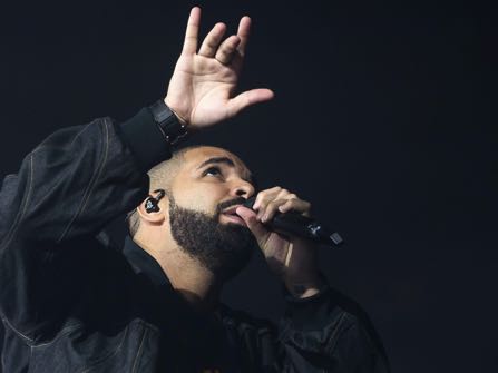 FILE - In this Aug. 5, 2016, file photo, Drake performs in concert as part of the Summer Sixteen Tour at Madison Square Garden in New York. Drake is canceling the rest of his summer tour because of an ongoing ankle injury. (Photo by Charles Sykes/Invision/AP, File)