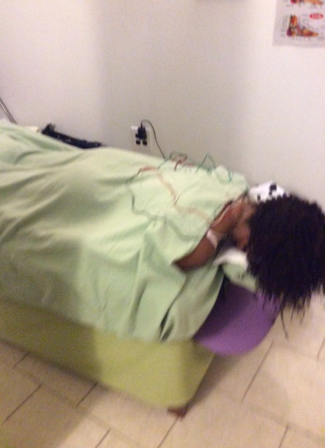 Jasmine Sanders gets acupuncture treatment.