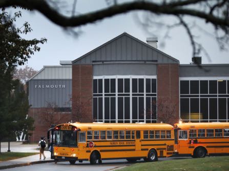 HOLD FOR RELEASE, DATE TBD-Students arrive at Falmouth High School, Friday, Oct. 21, 2016. The town of Falmouth is one of several municipalities around the country that has cancelled school on Election Day to avoid placing children at risk in case the heated rhetoric spills into confrontations or even violence at the polling places. (AP Photo/Robert F. Bukaty)