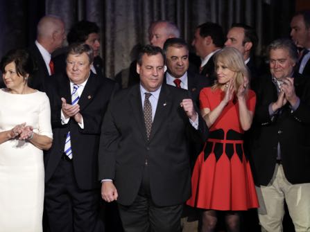 New Jersey Gov. Chris Christie pumps his fist as President-elect Donald Trump gives his acceptance speech during his election night rally, Wednesday, Nov. 9, 2016, in New York. (AP Photo/John Locher)