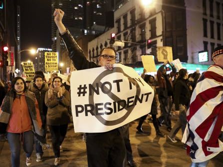 Protesters march North on State Street the day after Donald Trump was won the President Elect Wednesday, Nov. 9, 2016 in Chicago, Ill. (Armando L. Sanchez/Chicago Tribune)