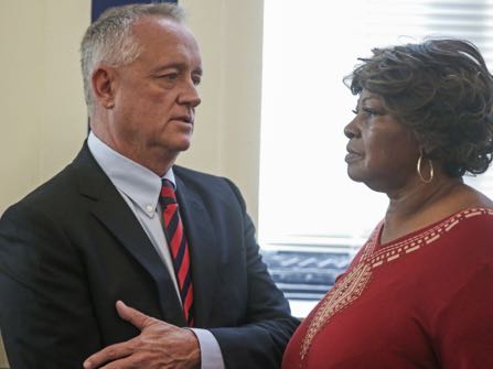 HOLD FOR TUESDAY, NOV. 22 – FILE – In this Nov. 1, 2016, file photo, Hamilton County Prosecutor Joe Deters, left, speaks with Audrey DuBose, right, the mother of Sam DuBose, in a courtroom at the Hamilton County Courthouse in Cincinnati. Hamilton County, Ohio, Prosecutor Joe Deters scheduled a Tuesday, Nov. 22, 2016, news conference to discuss the prosecution of white former University of Cincinnati police officer Ray Tensing, after a jury deadlocked and a judge declared a mistrial Nov. 12, 2016, on charges of murder and voluntary manslaughter in the fatal July 2015 shooting of black motorist Sam DuBose. (Carrie Cochran/The Cincinnati Enquirer via AP, Pool, File)