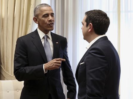 U.S. President Barack Obama, left, speaks with Greek Prime Minister Alexis Tsipras during their meeting at Maximos Mansion in Athens on Tuesday, Nov. 15, 2016. Obama is praising Greece for its financial commitment to NATO — specifically, for being one of five NATO allies that dedicated at least 2 percent of its gross domestic product to defense spending. (Simela Pantzartzi/Pool Photo via EPA)
