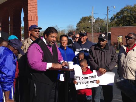 The Rev. William Barber, president of the North Carolina state NAACP, speaks during a news conference in Wilson, N.C., on Saturday, Nov. 5, 2016. Voting activists and volunteers fanned out over the presidential battleground of North Carolina on Saturday’s final day of early in-person voting to urge undecideds and the otherwise uninterested to cast ballots in close races for president, U.S. Senate and governor. (AP Photo/Gary Robertson)