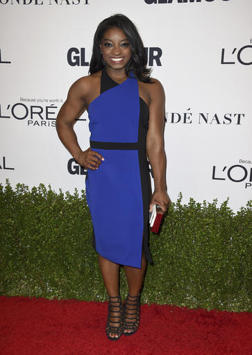 Simone Biles arrives at the Glamour Women of the Year Awards at NeueHouse Hollywood on Monday, Nov. 14, 2016, in Los Angeles. (Photo by Jordan Strauss/Invision/AP)