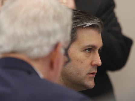 Former North Charleston police officer Michael Slager, right, sits in the courtroom during his murder trial at the Charleston County court in Charleston, S.C., Wednesday, Nov. 30, 2016. The case of a former South Carolina police officer charged with murder in the shooting death of an unarmed black motorist is now before the jury. (Grace Beahm/Post and Courier via AP, Pool)