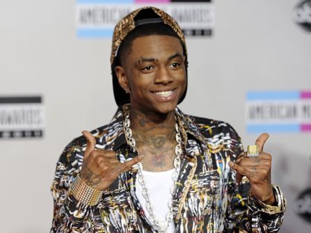 Soulja Boy arrives at the 39th Annual American Music Awards on Sunday, Nov. 20, 2011 in Los Angeles. (AP Photo/Chris Pizzello)