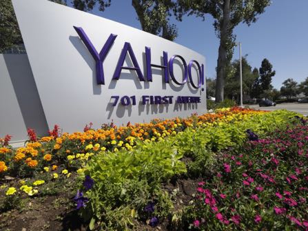 FILE - This Tuesday, July 19, 2016 photo shows a Yahoo sign at the company's headquarters in Sunnyvale, Calif. On Wednesday, Dec. 14, 2016, Yahoo said it believes hackers stole data from more than one billion user accounts in August 2013. (AP Photo/Marcio Jose Sanchez)