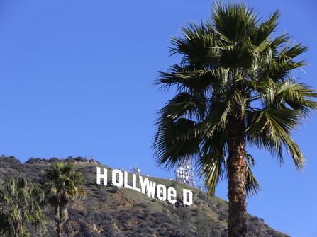 The Hollywood sign is seen vandalized Sunday, Jan. 1, 2017. Los Angeles residents awoke New Year's Day to find a prankster had altered the famed Hollywood sign to read "HOLLYWeeD." Police have notified the city's Department of General Services, whose officers patrol Griffith Park and the area of the rugged Hollywood Hills near the sign. California voters in November approved Proposition 64, which legalized the recreational use of marijuana, beginning in 2018. (AP Photo/Damian Dovarganes)