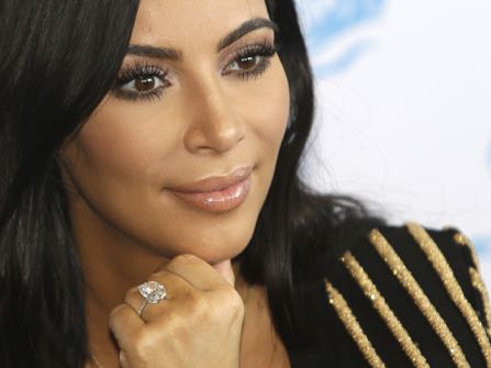 FILE - In this June 24, 2015 file photo, American TV personality Kim Kardashian attends the Cannes Lions 2015, International Advertising Festival in Cannes, southern France. Paris police Monday Jan.9, 2017 say 16 people have been arrested over Kim Kardashian jewelry heist. (AP Photo/Lionel Cironneau, File)