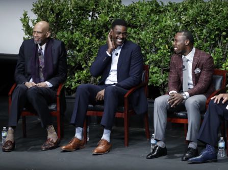 From left, former NBA basketball players Kareem Abdul-Jabbar, Chris Webber and NFL Football wide receiver Anquan Boldin smile during a sports and activism panel entitled "From Protest to Progress: Next Steps" Tuesday, Jan. 24, 2017, in San Jose , Calif. (AP Photo/Marcio Jose Sanchez)