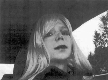 FILE - In this undated file photo provided by the U.S. Army, Pfc. Chelsea Manning poses for a photo wearing a wig and lipstick. Manning, a transgender soldier now serving 35 years at the Fort Leavenworth, Kansas military prison for leaking classified information to WikiLeaks, is asking President Barack Obama to commute her sentence to the 6 1/2 years she has already served. (U.S. Army via AP, File)
