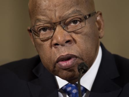 FILE - In this Jan. 11, 2017 file photo, Rep. John Lewis, D-Ga. testifies on Capitol Hill in Washington at the confirmation hearing for Attorney General-designate, Sen. Jeff Sessions, R-Ala., before the Senate Judiciary Committee. Lewis says he’s doesn’t consider Donald Trump a “legitimate president,” blaming the Russians for helping the Republican win the White House. (AP Photo/Cliff Owen, File)