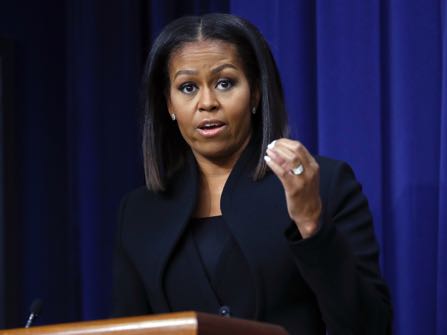 First lady Michelle Obama speaks after the screening for the movie 'Hidden Figures,' Thursday, Dec. 15, 2016, in the South Court Auditorium in the Eisenhower Executive Office Building on the White House complex in Washington. (AP Photo/Pablo Martinez Monsivais)