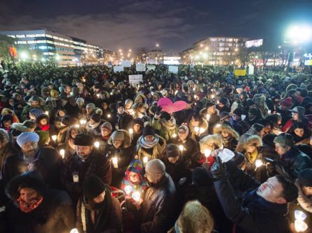 People attend a vigil for victims of the mosque shooting in Quebec City Monday, January 30, 2017 in Montreal.THE CANADIAN PRESS/Ryan Remiorz